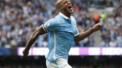 Vincent Kompany celebrates after scoring the second goal for Manchester City. Reuters / Andrew Yates