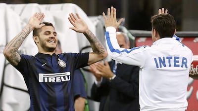 Inter were back on level terms five minutes later thanks to Rodrigo Palacio, took the lead through Mauro Icardi, left, on 34 minutes and then put the match virtually beyond all reach when Palacio completed his brace three minutes later. Alessandro Garofalo / Reuters