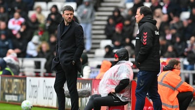 Manchester United's interim coach Michael Carrick and Sunderland's head coach Regis Le Bris. AFP