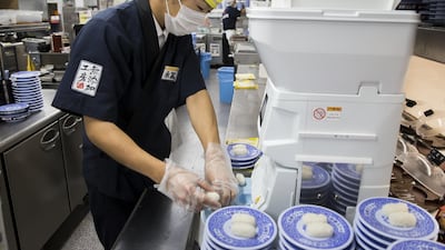 Suzumo Machinery's robots are used by about 70,000 customers around the world, ranging from sushi chains to factories.Tomohiro Ohsumi/Bloomberg