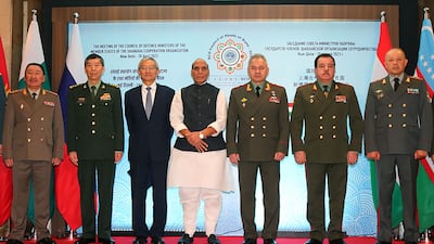 This handout photograph taken on April 28, 2023 and released by the Indian Ministry of Defence shows (L to R) Kyrgyzstan's Defence Minister Bekbolotov Baktybek Asankalievich, Chinese Defence Minister Li Shangfu, Shanghai Cooperation Organisation (SCO) Secretary-General Zhang Ming, Indian Defence Minister Rajnath Singh, Russian Defence Minister Sergei Shoigu, Tajikistan Defence Minister Sherali Mirzo and Uzbekistan Defense Minister Bakhodir Kurbanov posing for group picture during the SCO meet in New Delhi. AFP