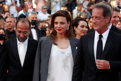 Iranian director Asghar Farhadi, left, served on the Cannes jury in 2022. EPA