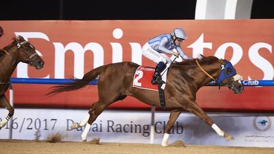Long River and Mickael Barzalona win the Al Maktoum Challenge Round 3 at Meydan Racecourse on Saturday. Dubai Racing Club / Andrew Watkins