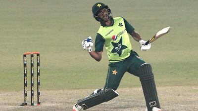 Hasan Ali celebrates after playing a winning shot as Pakistan won the T20 series against South Africa at the Gaddafi Stadium in Lahore on February 14, 2021. AFP