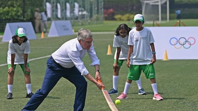 International Olympic Committee president Thomas Bach plays cricket at an event in Mumbai on October 9, 2023. FPA