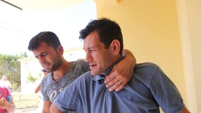 bdullah al-Kurdi, the father of the drowned 3-year-old boy Aylan Kurdi from Syria, cries at a morgue as he tries to get his son's body in Mugla, Turkey, 03 September 2015. EPA