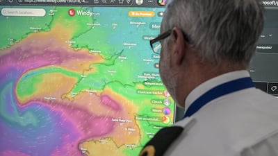 An officer at the Falmouth Maritime Rescue Co-ordination Centre, in Cornwall, south-west England, monitors Storm Goretti. Getty Images