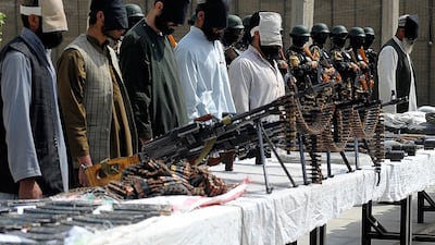 Blindfolded insurgents are presented to media after being captured by security forces in Kandahar, in March 2012. AFP