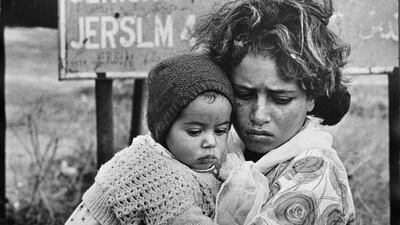This picture taken in 1968 shows Palestinian refugees arriving in east Jordan in a continuing exodus of Palestinians from the West Bank and Gaza Strip. It is one of the 525,000 photos digitised by the United Nations Relief and Works Agency to mark the Nakba’s 66th anniversary. AP Photo/G.Nehmeh, UNRWA Photo Archives