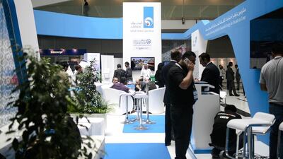Above, the Adnoc stand at ADRAC. The Abu Dhabi national oil company is hosting the event. Lee Hoagland / The National
