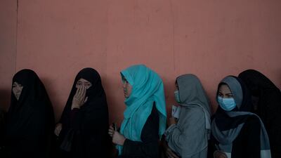 Two suspects were arrested after the four bodies were found at a house in Mazar-i-Sharif. AP