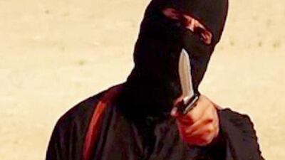 The masked British militant Mohammed Emwazi from a video released by ISIL. AFP