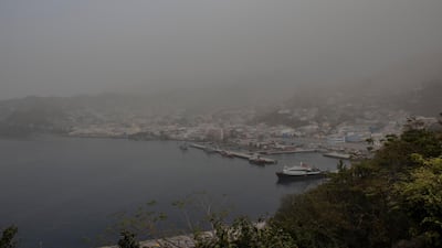 Volcanic ash has covered many parts of St Vincent, including the capital Kingstown, while a sulphurous cloud of smoke hangs in the air. AP Photo