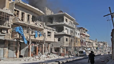 Smoke billows from a building following a reported bombardment by pro-Syrian government forces in the town of Maaret al-Numan in Syria's Idlib province, the country's last major opposition bastion. AFP