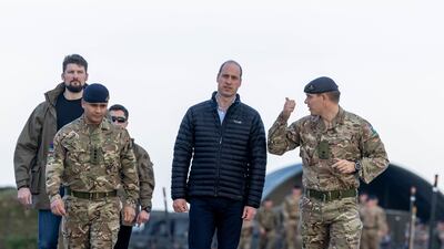 Prince William meets members of the British Armed Forces stationed in Poland. Getty