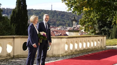 Liz Truss is welcomed by Prime Minister of the Czech Republic, Petr Fiala, as she arrives at Kramar's Villa before the summit on Thursday with European leaders. PA