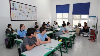 Students attend a physics class