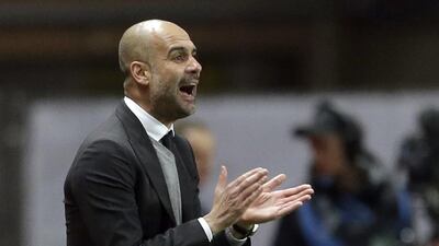 Manchester City manager Pep Guardiola is upbeat about the next season. Claude Paris / AP Photo