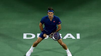 Federer prepares to receive a serve. Getty