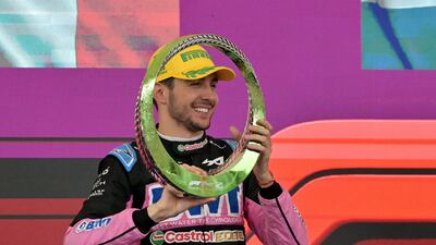 Alpine driver Esteban Ocon celebrates his second place at the podium. AFP
