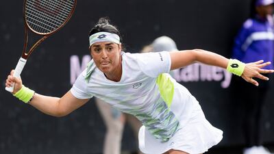Ons Jabeur of Tunisia celebrates on her way to winning the Charleston Open., in South Carolina, against Switzerland's Belinda Bencic. AP Photo