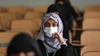 A volunteer for a coronavirus awareness campaign seen in Sanaa, Yemen. Reuters