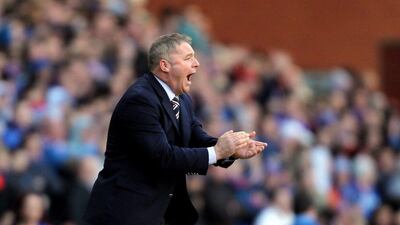 Ally McCoist has managed Rangers to 10 wins, two draws and four losses in the Scottish Championship this season. Ian MacNicol / AFP