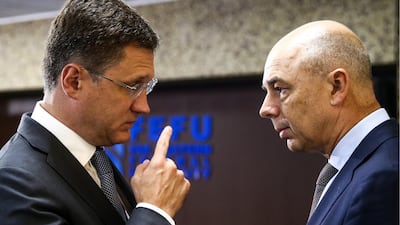 Russia's Energy Minister Alexander Novak (L) and First Deputy Prime Minister, Russia's Finance Minister Anton Siluanov (R) attend a meeting of foreign business representatives during the Eastern Economic Forum in Vladivostok, Russia, 11 September 2018. TASS