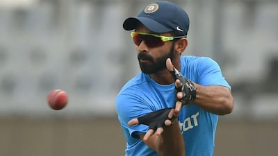 India’s Ajinkya Rahane catches a ball during training. Punit Paranjpe / AFP