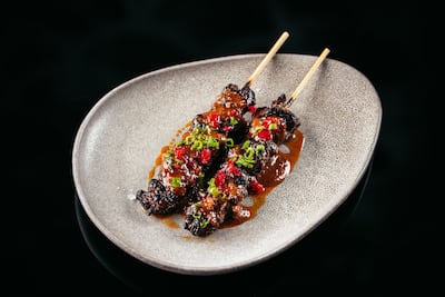 Lamb sate (aka satay) skewers are a Middle Eastern riff on the classic chicken version. They are served with a peanut sauce. Photo: Goldfish
