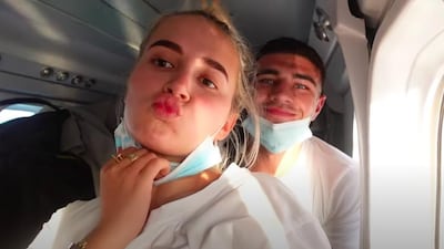 Molly-Mae Hague and Tommy Fury pulled their masks down while on a seaplane in the Maldives. YouTube / Molly-Mae Hague
