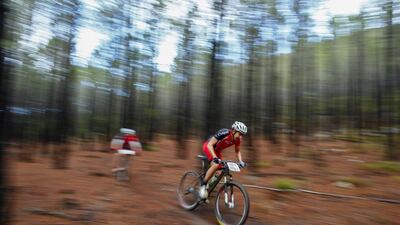 Michael Potton from South Africa competes during Stage 2 of the Absa Cape Epic mountain bike race on Tuesday in Elgin, South Africa. Nic Bothma / EPA