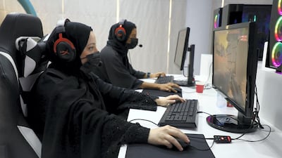 Rana Malas and Mariam Al Mazrouei playing computer games at sQuad Core, a gaming lounge exclusively for women. Wajod Alkhamis / The National