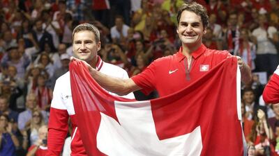 Roger Federer beat Fabio Fognini of Italy to send Switzerland to the Davis Cup final. Salvatore Di Nolfi / AP / Keystone / September 14, 2014