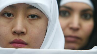 Readers discuss the real causes of an attack on a woman wearing a hijab. Pascal Le Segretain/Getty Images