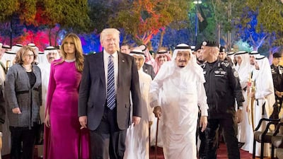 King Salman arrives at Murabba Palace with Mr Trump and the First Lady Melania Trump. SPA / EPA