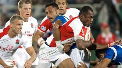 Isoa Damudamu, with the ball, is a man in a hurry. After playing in Dubai and the ensuing South Africa Sevens, he will be return to the UK to cram in a variety of Army courses.