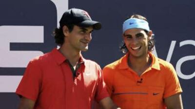 Roger Federer and Rafael Nadal share a laugh during Arthur Ashe Kids' Day prior to the US Open. Can Nadal now steal the US title from Federer?