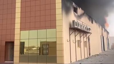 Smoke billows from the perfume factory in Umm Al Quwain. Photo: UAQ News/sceengrab