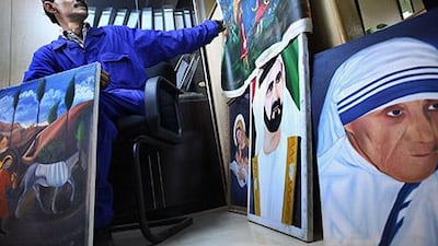 Mr Karunakaran, 39, paints during his spare time in his room that he shares with five others. Delores Johnson / The National