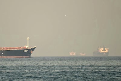 Cargo ships and tankers are seen off coast city of Fujairah, in the Strait of Hormuz in the northern Emirate on February 25, 2026. AFP