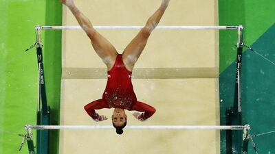 United States’ Aly Raisman performs on the parallel bars during the women’s gymnastics individual all-around final at the 2016 Rio Olympics at Rio Olympic Arena on August 11, 2016 in Rio de Janeiro, Brazil. Morry Gash / AP Photo