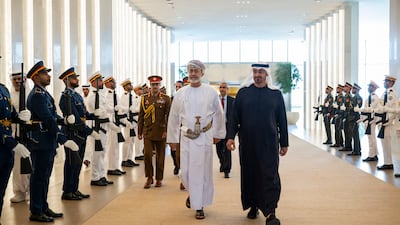 President Sheikh Mohamed, right, welcomes Sultan Haitham, Ruler of Oman. Abdulla Al Neyadi / UAE Presidential Court