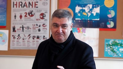 Incumbent President of Croatia Zoran Milanovic casts his ballot during the first round of presidential elections in Zagreb, on December 29. EPA