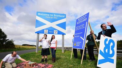Members of English Scots for Yes hold a border tea party to celebrate the continuing open border between Scotland and England after a possible Yes vote in the Scottish independence referendum on September 18. Jeff J Mitchell / Getty Images