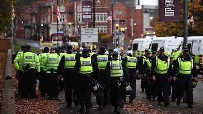 Police officers on the move towards Villa Park. AFP