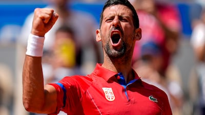 Serbia's Novak Djokovic celebrates his 7-5, 6-3 victory over Germany's Dominik Koepfer in their Paris 2024 Olympics men's singles third-round match at the Roland Garros stadium on Wednesday, July 31. AP