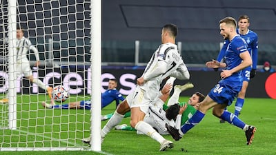 13) Cristiano Ronaldo scores goal No 13 for the season against Dynamo Kiev in the Champions League on December 2. Shutterstock