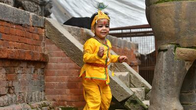 A child dressed as Krishna on the outskirts of Kathmandu. AFP