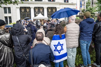 Parisians attend a rally against antisemitism. EPA